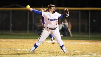 Columbia pitcher Laila Arnold winds up to pitch against Columbia on Feb. 22. (BRENT KUYKENDALL/Lake City Reporter)
