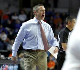 Florida coach Mike White yells to his players during an NCAA college basketball game against Mississippi on Tuesday, in Gainesville. (AP PHOTO)