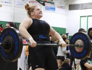 Columbia weightlifter Reece Chasteen lifts the bar during her clean and jerk at the Region 1-2A Meet on Saturday. (JEN CHASTEEN/Special to the Reporter)