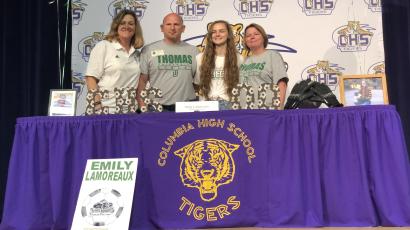 Columbia goalkeeper Emily Lamoreaux signed her national letter of intent to play at Thomas University on Wednesday. Pictured are Thomas coach Julie Orlowski (from left), Lamoreaux's father Terry, Lamoreaux, and Lamoreaux's mother Gina. (JORDAN KROEGER/Lake City Reporter)
