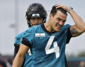Jacksonville Jaguars kicker Josh Lambo on the field between drills during training camp at the practice fields outside TIAA Bank Field on July 30 in Jacksonville. (TRIBUNE NEWS SERVICE)