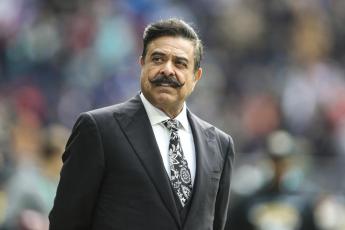  Jacksonville Jaguars owner Shad Khan is pictured on the field before a game against the Miami Dolphins at Tottenham Hotspur Stadium on Oct. 17 in London. (AP FILE)