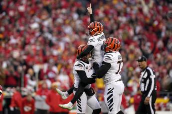 Cincinnati Bengals kicker Evan McPherson (2) celebrates with teammates after kicking a 31-yard field goal during overtime in the AFC championship game to beat the Kansas City Chiefs on Sunday in Kansas City, Mo. The Bengals won 27-24. (ERIC GAY/Associated Press)