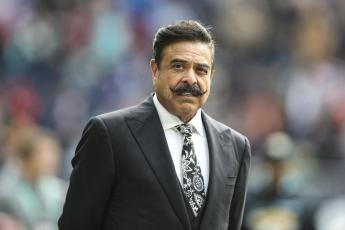 Jacksonville Jaguars owner Shad Khan is shown on the field before a game against the Miami Dolphins at Tottenham Hotspur Stadium on Oct. 17, 2021, in London. (AP File)