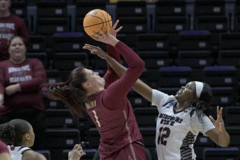 Florida State center River Baldwin (1) shoots against Missouri State forward Jennifer Ezeh (12) during their First Four game in the NCAA tournament on Thursday in Baton Rouge, La. (MATTHEW HINTON/Associated Press)