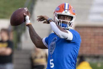 Florida quarterback Emory Jones warms up for the team's game against Missouri on Nov. 20, 2021, in Columbia, Mo. (AP File)