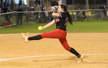 Fort White pitcher Kadence Compton winds up to pitch against Branford on Tuesday night. (MORGAN MCMULLEN/Lake City Reporter)