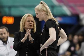 Florida State head coach Sue Semrau speaks with guard Sammie Puisis during a game against North Carolina State at the Atlantic Coast Conference tournament on March 4 in Greensboro, N.C. (GERRY BROOME/Associated Press)