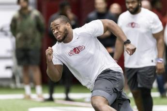 Evan Neal participates in position drills at Alabama's NFL Pro Day on March 30 in Tuscaloosa, Ala. (AP File)