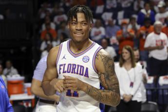 Former Florida forward Keyontae Johnson smiles after being introduced as a starter before a game against Kentucky, on March 5 in Gainesville. (AP FILE)