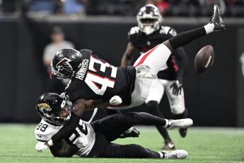 Atlanta Falcons cornerback Matt Hankins breaks up a pass against Jacksonville Jaguars receiver Jeff Cotton Jr. (88) during Saturday’s preseason game in Atlanta. (DANNY KARNIK/Associated Press)