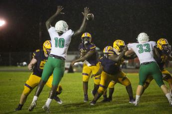 Columbia quarterback Tyler Jefferson throws a pass against DeLand on Sept. 9. (BRENT KUYKENDALL/Lake City Reporter)