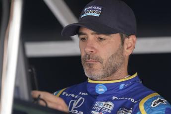 Jimmie Johnson sits in his pit box before the final practice for the Indianapolis 500 at Indianapolis Motor Speedway on May 27 in Indianapolis. (AP FILE)