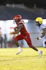 Lafayette running back Kiami McKnight pulls away from a Zarephath Academy defender on a touchdown run Friday night at Dale Walker Field. (JACK HOWDESHELL/Special to the Reporter)