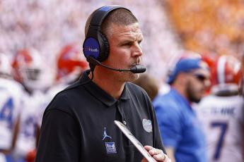 Florida head coach Billy Napier watches his team Saturday's game against Tennessee in Knoxville, Tenn. (WADE PAYNE/Associated Press)