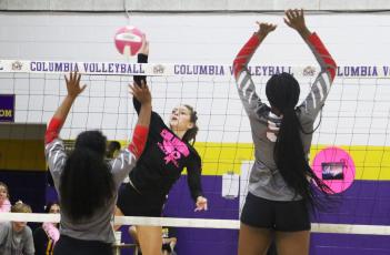 Columbia’s Sinei Wood sends a shot over the net against Bradford on Thursday. (MORGAN MCMULLEN/Lake City Reporter)