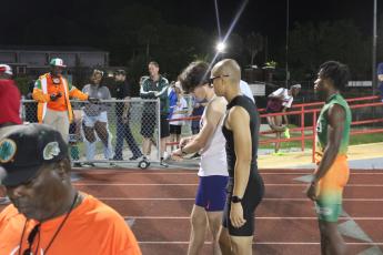 Columbia's Jose Rodriguez walks up to the start line of the 800m run at the Santa Fe mini meet on Thursday. (COURTESY)