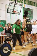 Suwannee head coach Brittney Shearer celebrates after Elisia Beauchamp completed her clean and jerk during the Region 1-1A meet on Feb. 4. (PAUL BUCHANAN/Special to the Reporter)