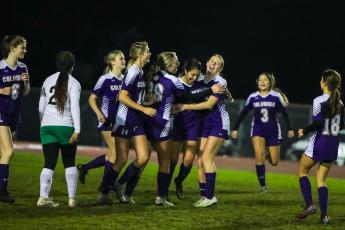Columbia players celebrate with Carla Medina-Rodriguez (second from right) after she scored a goal against Suwannee on Thursday night. (BRENT KUYKENDALL/Lake City Reporter)