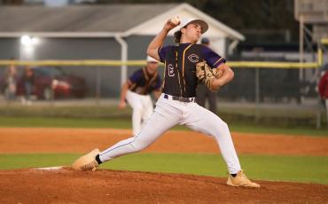 Columbia pitcher Grant Bowers winds up to pitch against North Marion on Tuesday night. (BRENT KUYKENDALL/Lake City Reporter)