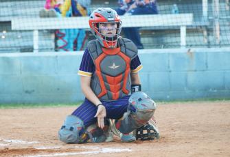 Columbia catcher Emily Delgado looks to the dugout during a game against Taylor County last season. (JORDAN KROEGER/Lake City Reporter)