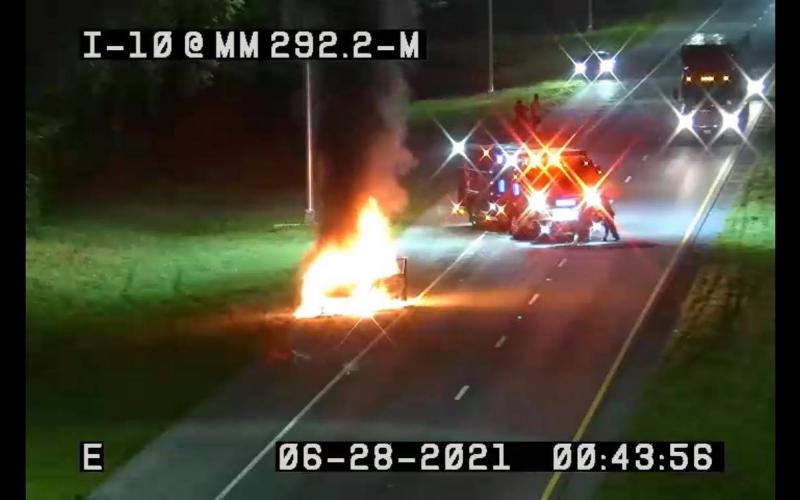 Suwannee County Fire Rescue crews respond to a burning van on Interstate 10 west just after midnight Monday morning. (COURTESY)