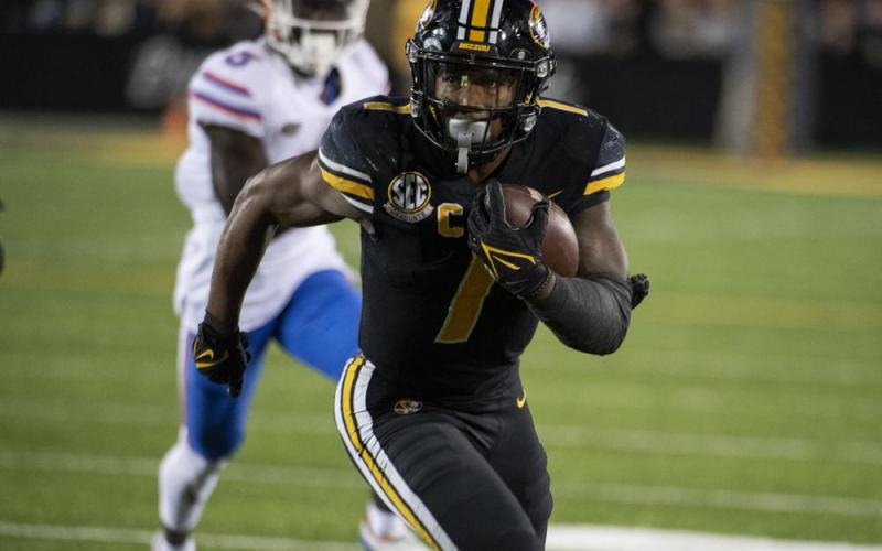 Missouri running back Tyler Badie scores a touchdown against Florida during overtime of Saturday’s game in Columbia, Mo. (L.G. PATTERSON/Associated Press)