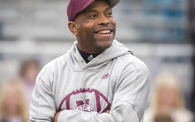  Former Mississippi State interim head coach Greg Knox watches his team warm up before the TaxSlayer Bowl against Louisville on Dec. 30, 2017, in Jacksonville. Knox is stepping in for Dan Mullen for the second time in five years. (AP FILE)
