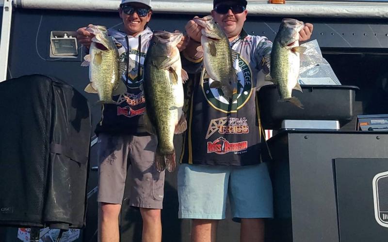 Bryson O’Steen (left) and Zack Barrera show off their catches from the Abu Garcia MLF College Tournament. (COURTESY)