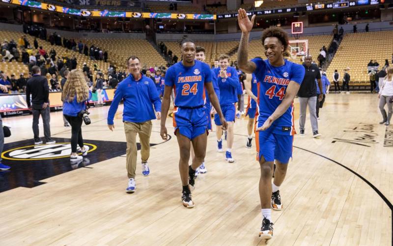 Florida's Niels Lane, right, celebrates as he walks off the court after beating Missouri 66-65 on Wednesday in Columbia, Mo. (L.G. PATTERSON/Associated Press)