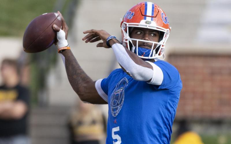 Florida quarterback Emory Jones warms up for the team's game against Missouri on Nov. 20, 2021, in Columbia, Mo. (AP File)