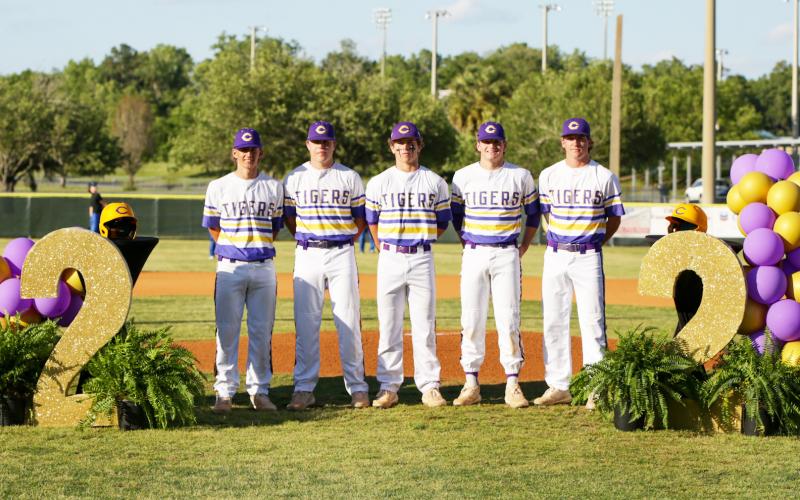 Columbia seniors Ty Jackson (from left), Brent Howard, Truitt Todd, Ty Floyd and Kade Jackson were all honored prior to Friday’s game against Ridgeview for Senior Night. (BRENT KUYKENDALL/Lake City Reporter)