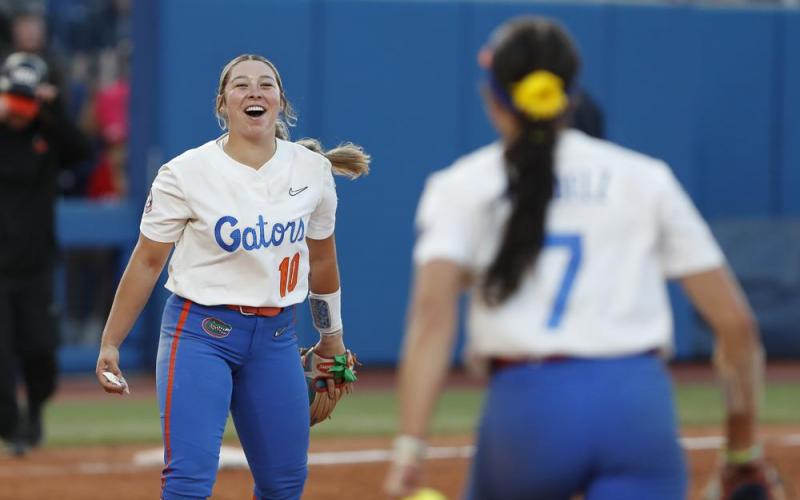 Florida’s Natalie Lugo (10) celebrates after the final out against Oregon State in the Women’s College World Series on Thursday in Oklahoma City. (ALONZO ADAMS/Associated Press)
