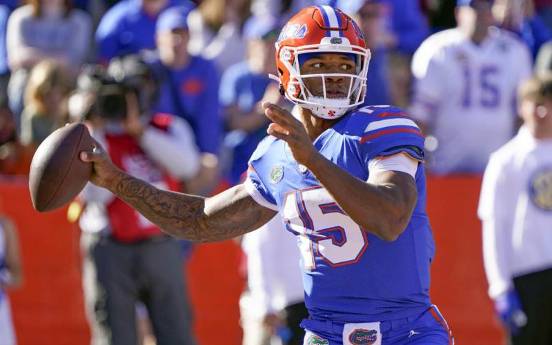 Florida quarterback Anthony Richardson looks for a receiver against Florida State on Nov. 27, 2021, in Gainesville. (JOHN RAOUX/Associated Press)