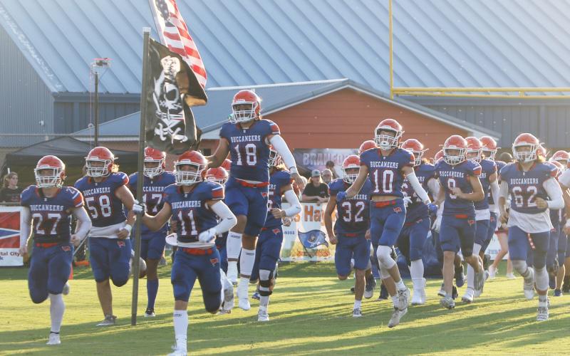 Branford’s football team heads out on to the field for last Friday’s Preseason Classic against Fort White. (MORGAN MCMULLEN/Lake City Reporter)