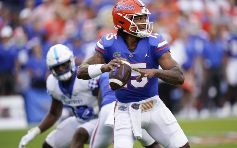 Florida quarterback Anthony Richardson throws a pass against Kentucky on Saturday in Gainesville. (JOHN RAOUX/Associated Press)