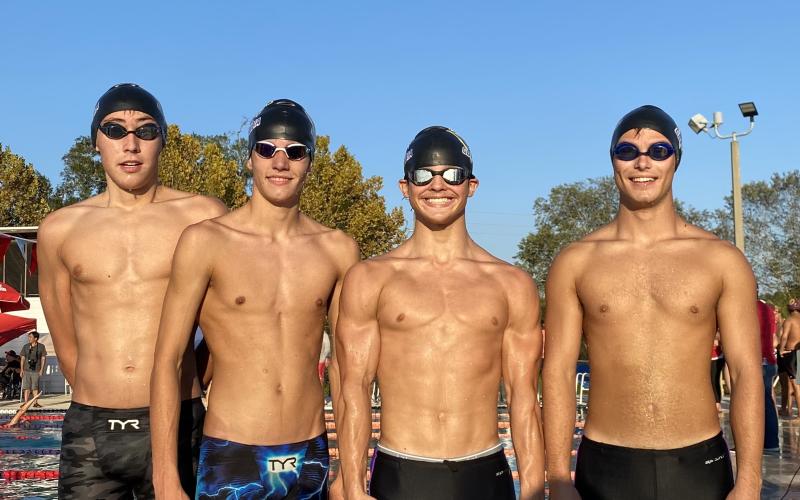 Columbia’s boys 200 freestyle relay team of Ian Disosway (from left), William Glover, Tristian Cox and Seth Grubb. (COURTESY)