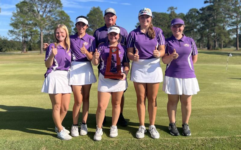 Columbia’s girls golf team finished runner-up at the Region 1-2A tournament on Tuesday. FRONT ROW: Veona Osborne (from left), Alison O’Brien, Karlee Gainey, Ashley Nelson and Megan Ruwe. BACK ROW: Head coach Chet Carter. (COURTESY)