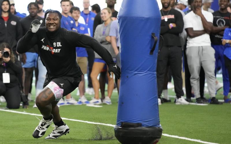 Florida defensive lineman Gervon Dexter Sr. performs a drill during his Pro Day on March 30 in Gainesville. (JOHN RAOUX/Associated Press)