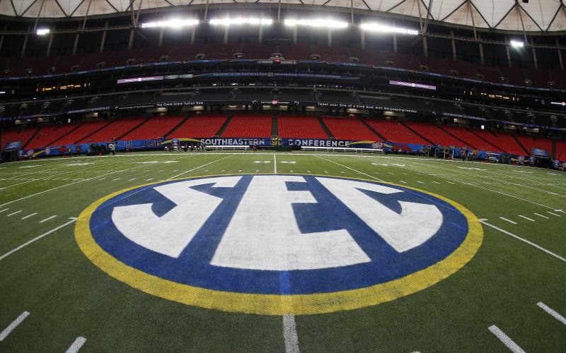 The SEC logo is displayed on the field ahead of the SEC championship game between Alabama and Missouri on Dec. 5, 2014, in Atlanta. (AP File)
