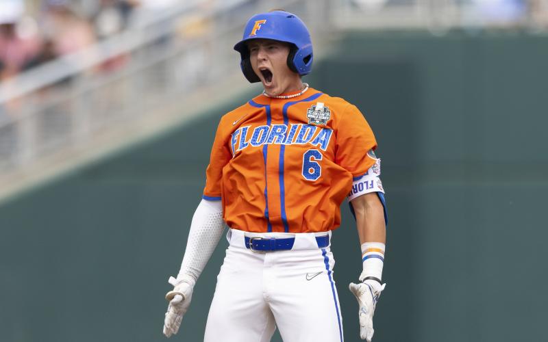 Florida’s Tyler Shelnut, a Fort White High graduate, celebrates after hitting a double against TCU in the ninth inning of Wednesday’s at College World Series game in Omaha, Neb. (REBECCA S. GRATZ/Associated Press)