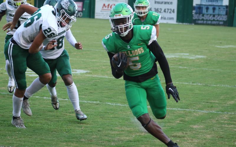 Suwannee receiver MJ Rossin runs up the field for a touchdown against Flagler Palm Coast on Friday night. (JAMIE WACHTER/Lake City Reporter)