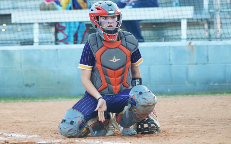 Columbia catcher Emily Delgado looks to the dugout during a game against Taylor County last season. (JORDAN KROEGER/Lake City Reporter)