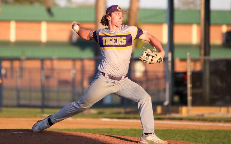 Columbia pitcher Ayden Phillips pitches against Suwannee on Thursday. (BRENT KUYKENDALL/Lake City Reporter)