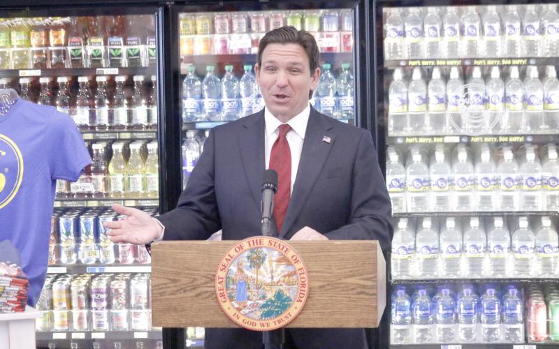 Gov. Ron DeSantis awarded more than $60 million in funding to rural North Florida counties, including a handful of awards to Suwannee County, during a press conference Thursday morning at the Busy Bee Travel Center in Live Oak. (JAMIE WACHTER/Lake City Reporter)