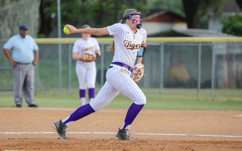 Columbia pitcher Harleigh Price winds up to pitch against Trenton on April 9. (BRENT KUYKENDALL/Lake City Reporter)
