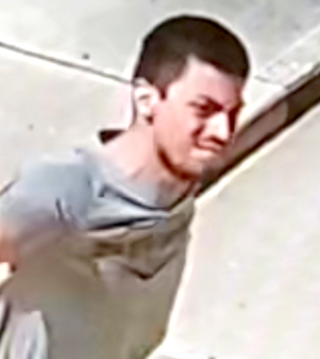 An unidentified man smashed out a side window at the Columbia Courthouse Annex on Friday by throwing a hammer through it. He also broke a window on a county employee’s car with the hammer. If you recognize this man, call the Lake City Police Department at 386-752-4343. (COURTESY)
