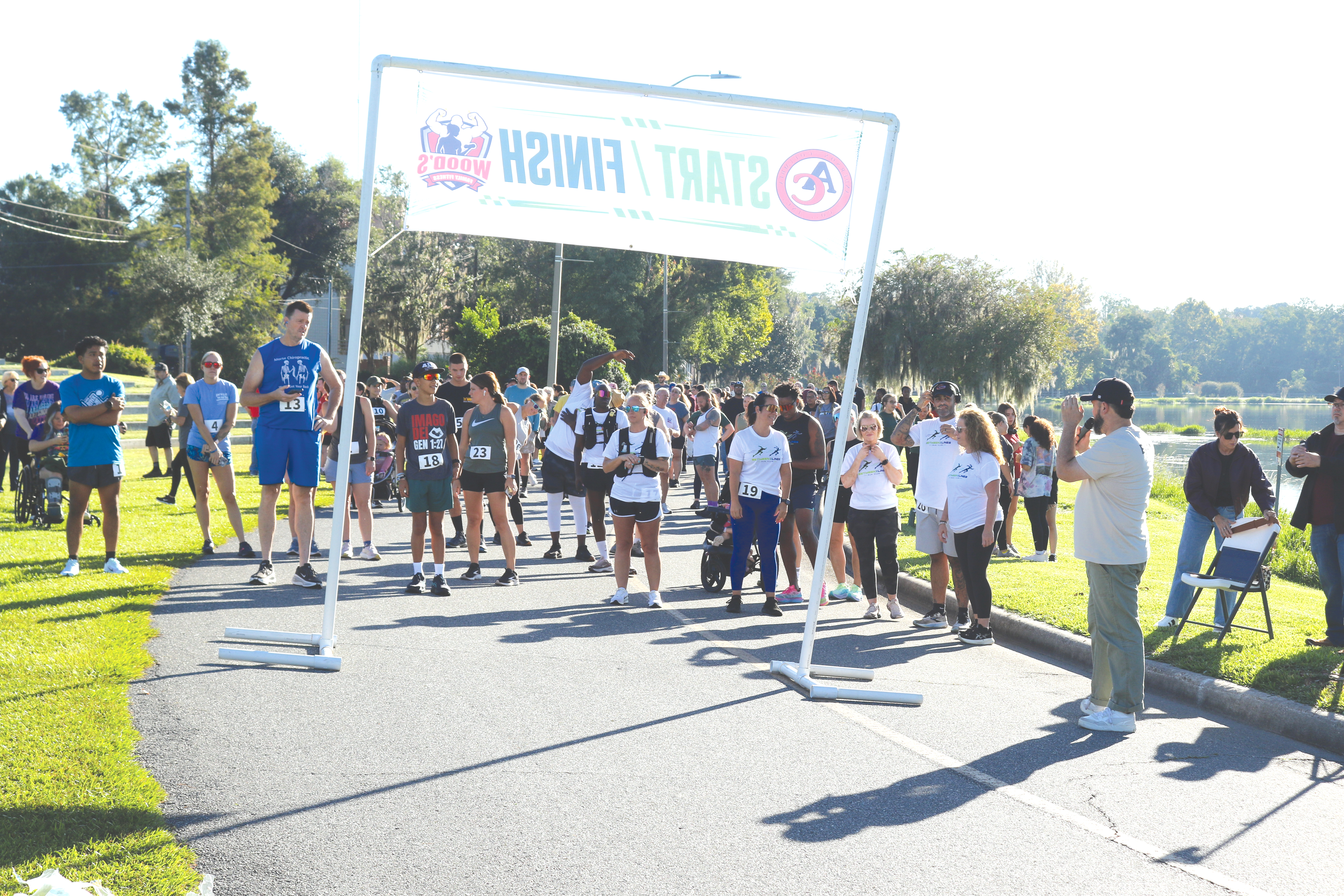 Runners at the Pregnancy Care Center 5K Walk/Run for Life get set up near the starting line of Saturday’s event. Hundreds turned out for the fundraiser. (TONY BRITT/Lake City Reporter)