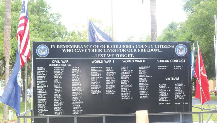 A memorial wall lists the names of Columbia County residents who lost their lives across different eras of American military history. The list sits outside the Lake City VA Medical Center, which will host a free, family friendly event on June 5. (TONY BRITT/Lake City Reporter)