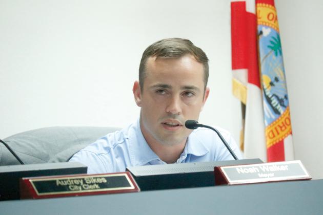Lake City Mayor Noah Walker, shown in Monday’s council meeting, said during a budget workshop Tuesday that spending $13,000 on a parade float was a ‘crazy idea.’ (JAMIE WACHTER/Lake City Reporter)